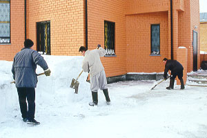 Students are shoveling snow
